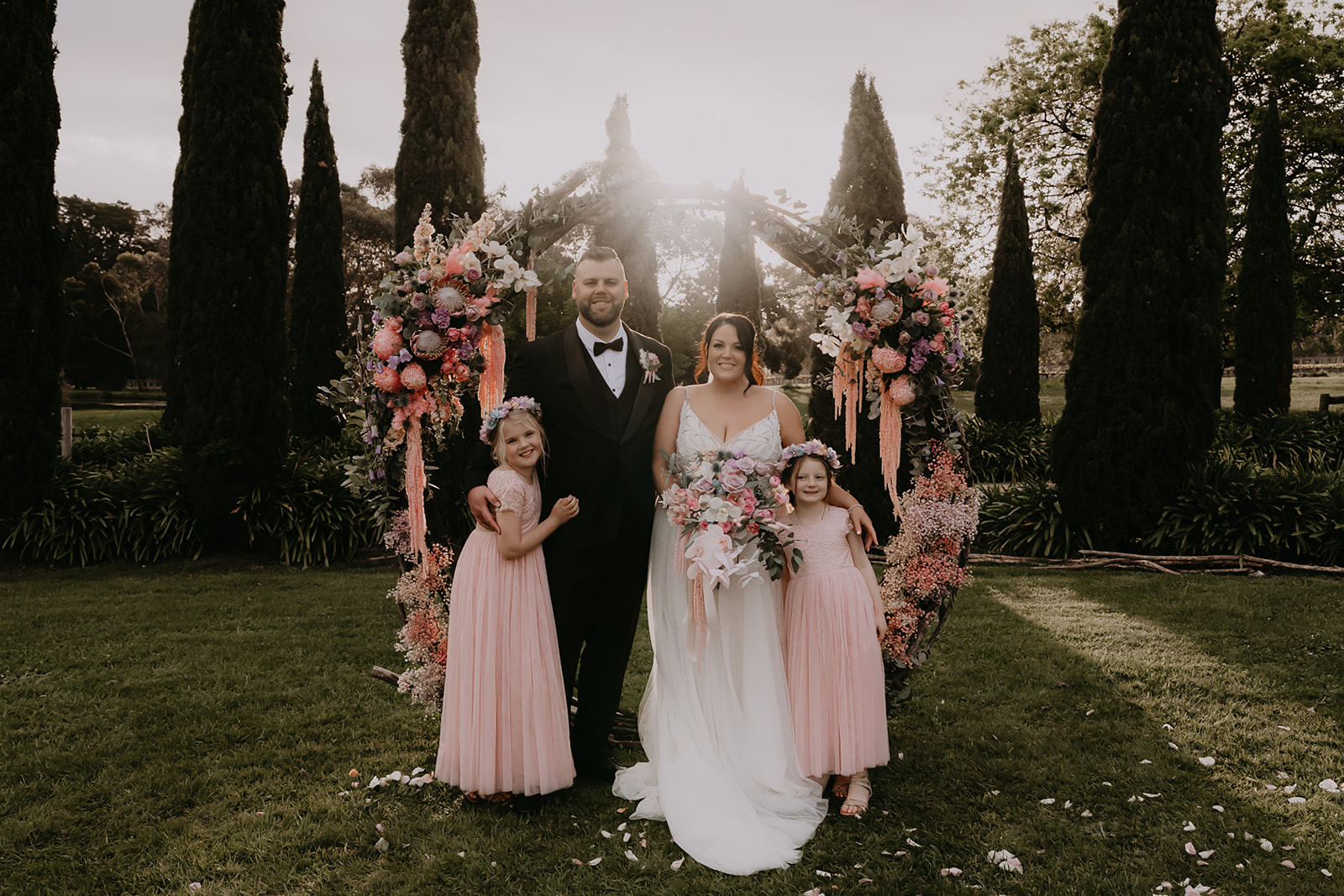 Martin with his wife and flower girls on their wedding day